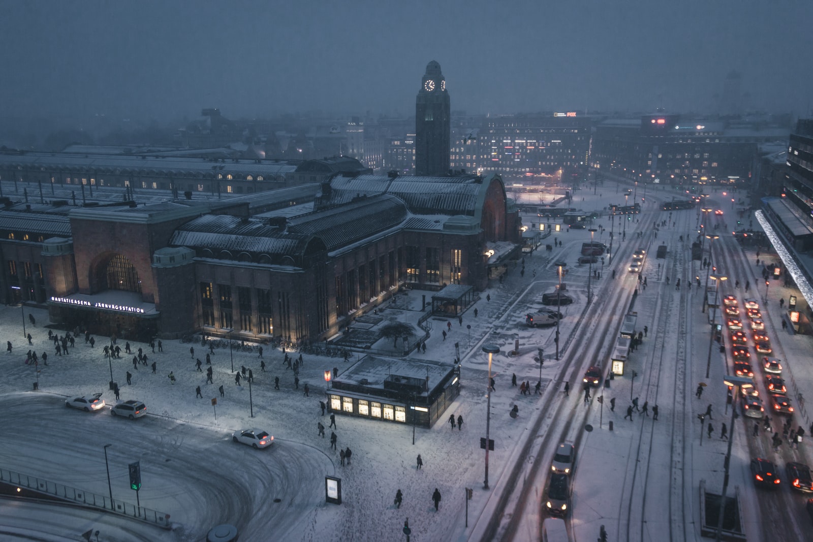aerial photography of street at night covered with snow