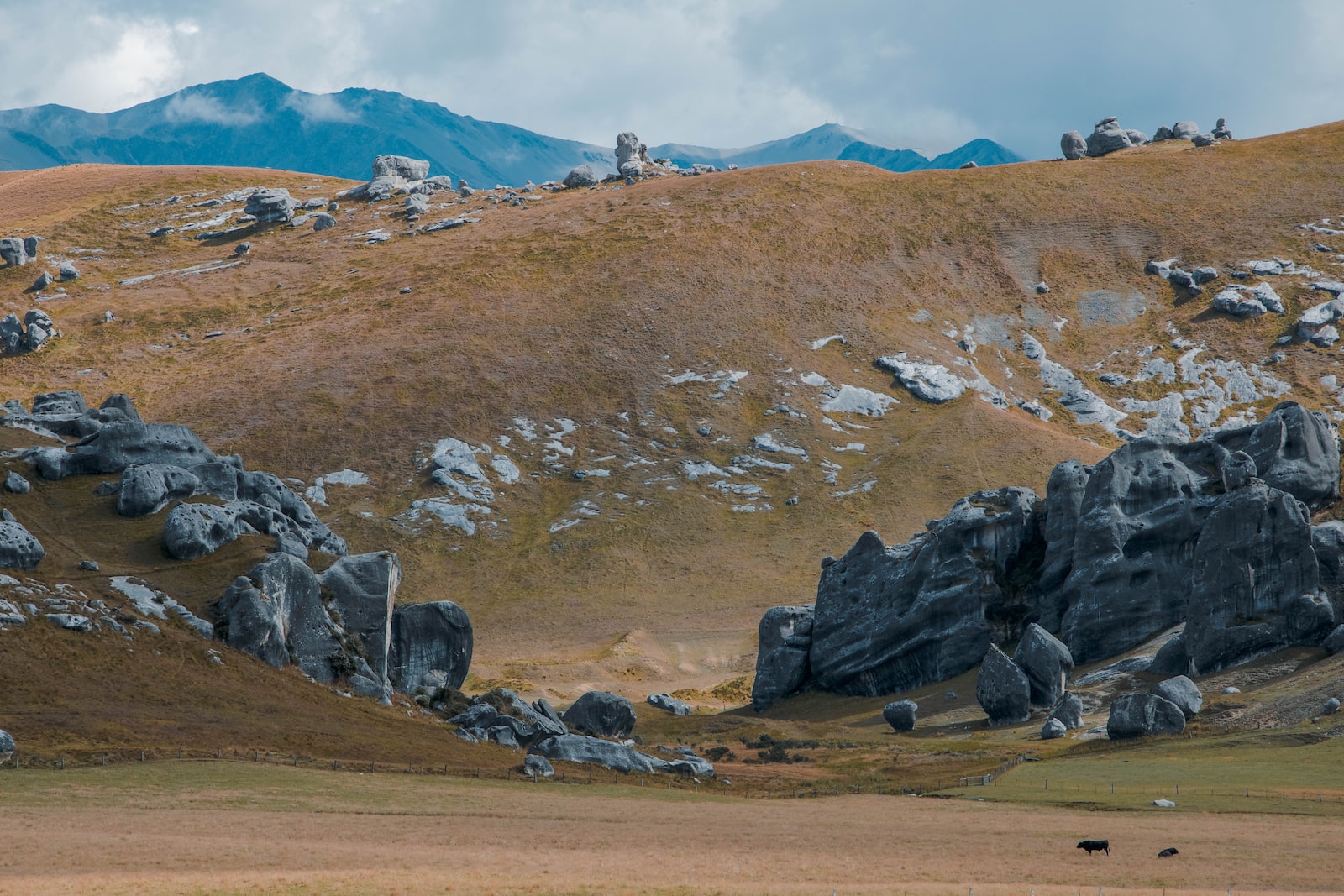 rock formations near mountain taken during daytime